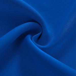 Royal blue ribbed fabric swatch with a subtle sheen, draped to showcase texture and folds.