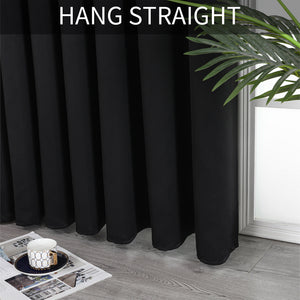 Black extra wide blackout curtains with straight pleats, ideal for sliding glass doors or room dividers.