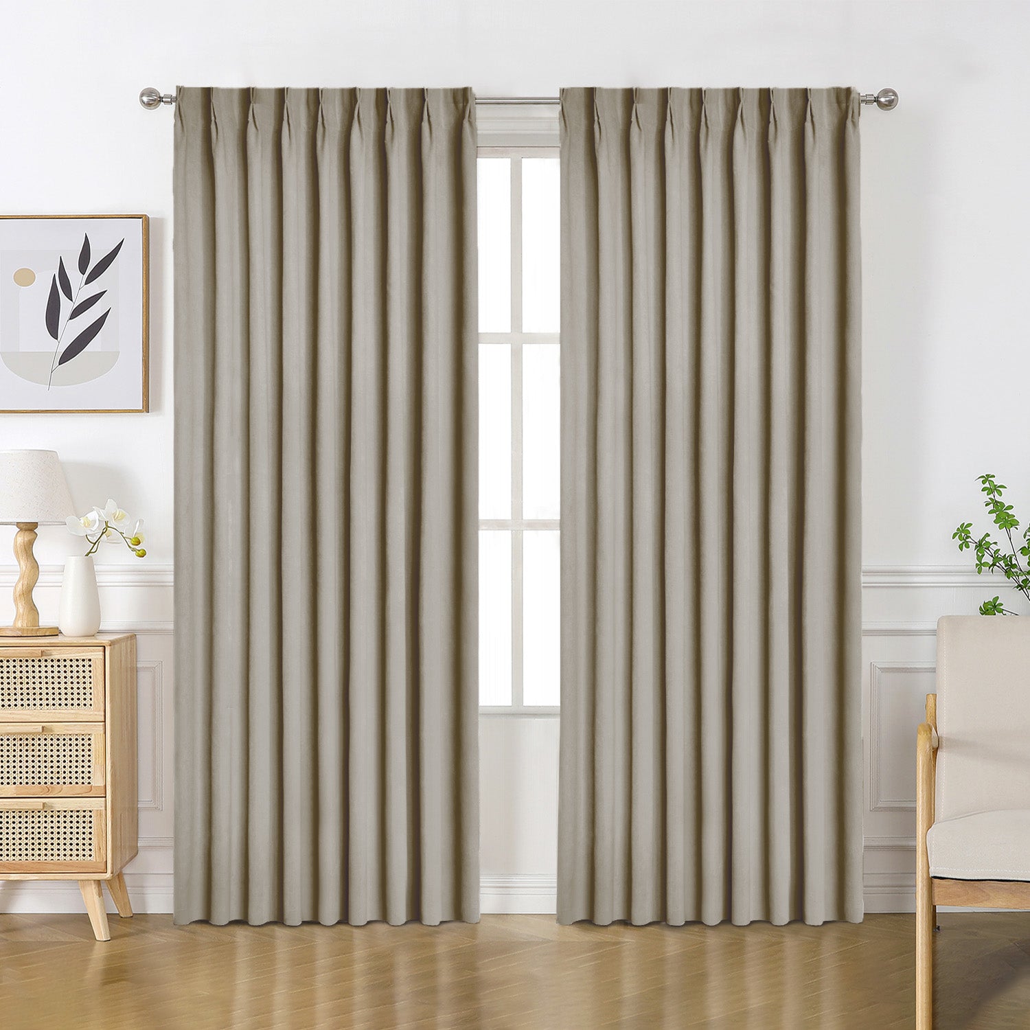 Taupe velourette chenille blackout curtains with grommet tops, plush texture and folds in modern room.