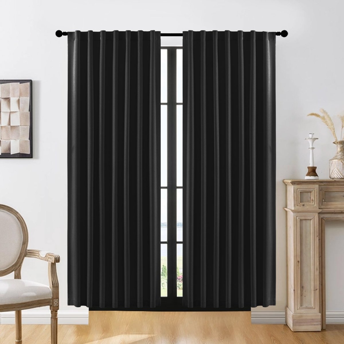 Joydeco 100% blackout curtains in black, brushed texture fabric, shown with rod pocket in a living room.