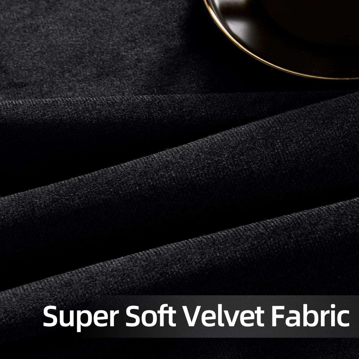 Close-up of black velvet fabric texture with plush feel, showcasing luxurious soft velvet curtain material.