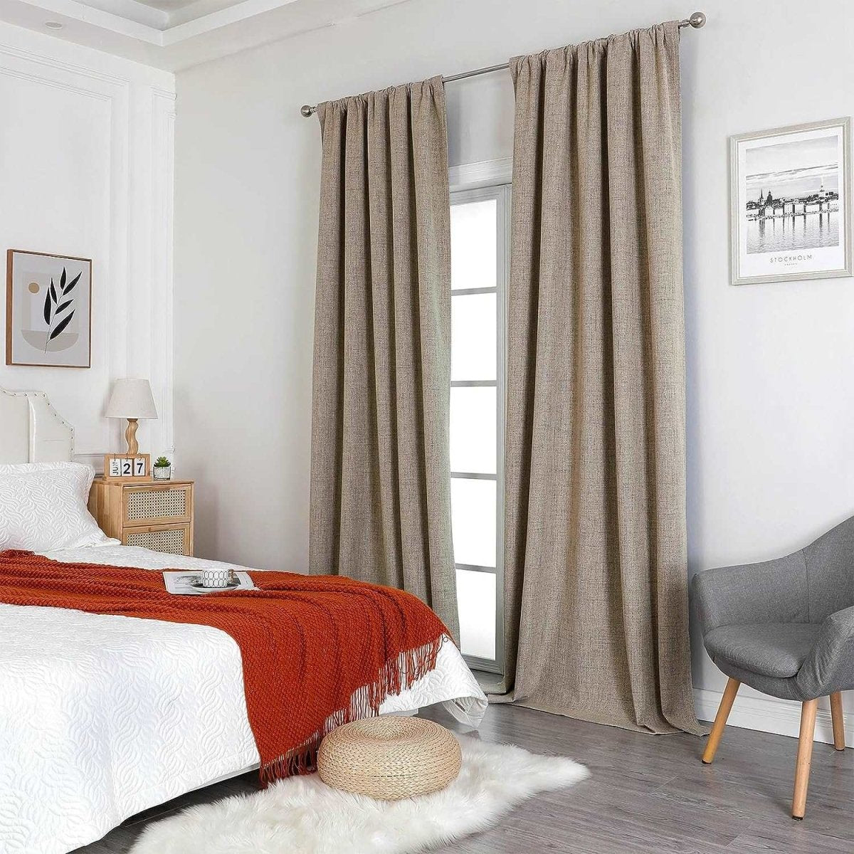Joydeco taupe linen blackout curtains in a bedroom, showing texture and drape.