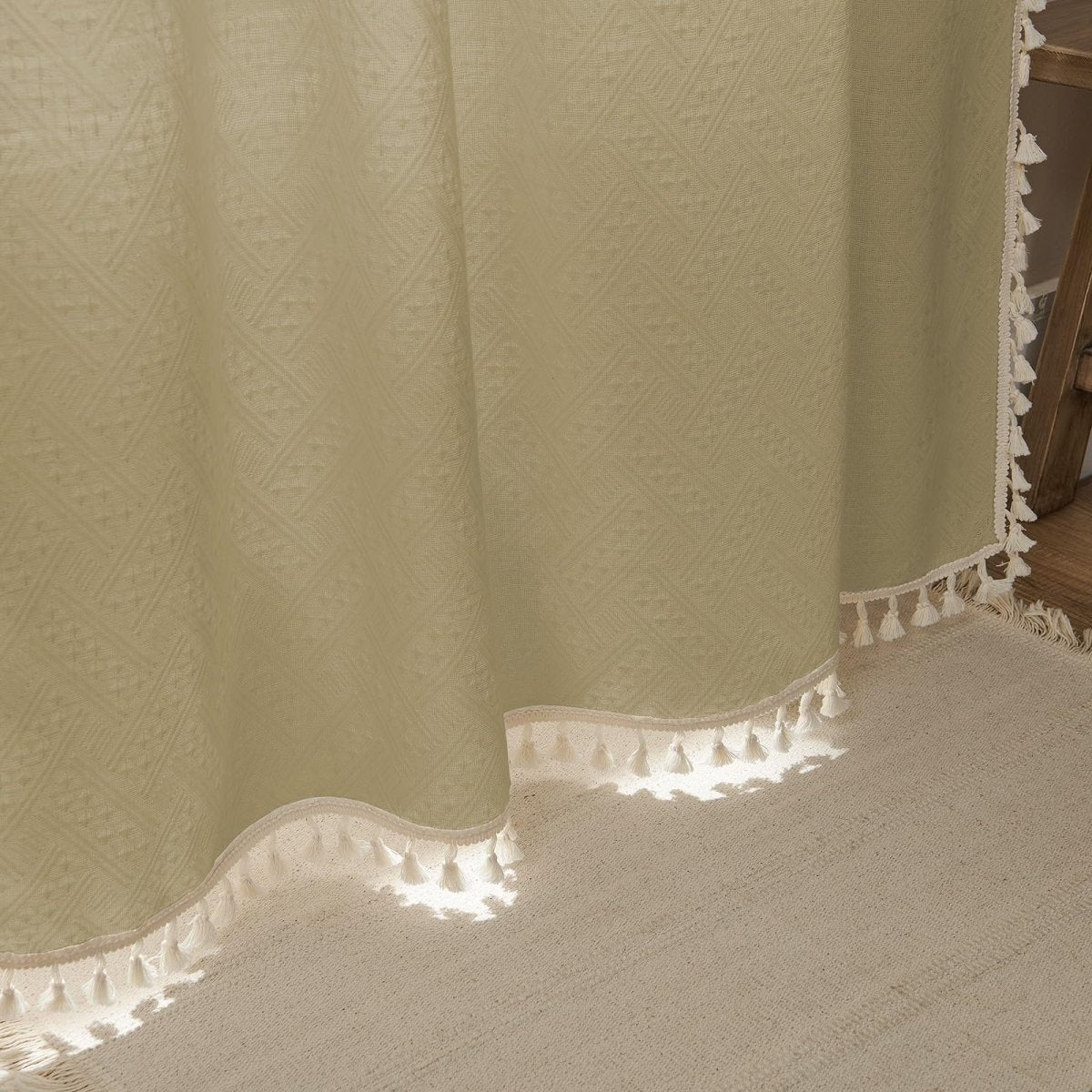 Light blue boho farmhouse sheer curtains, linen texture, with cream tassels.