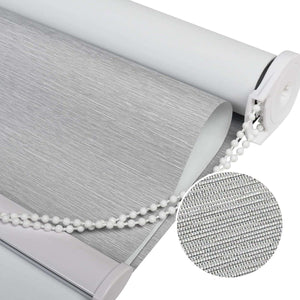 Close-up of Joydeco light grey roller shade with 100% blackout Striped Jacquard fabric texture and white beaded chain.