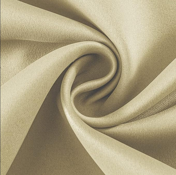 Joydeco light beige blackout curtain fabric close-up showing soft texture and elegant drape.