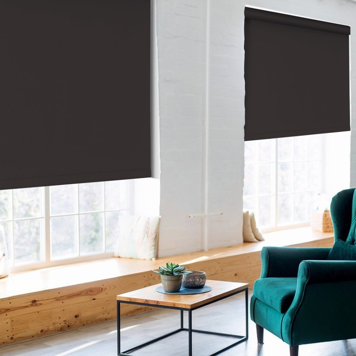 Joydeco Custom Blackout Roller Shades, dark gray, in modern living room with teal armchair.