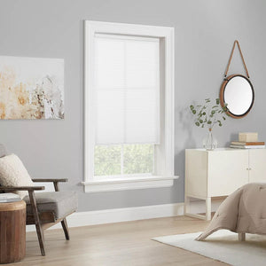 Joydeco white cordless cellular shade light filtering window blind in a modern bedroom.