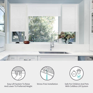 Custom white cordless light filtering cellular shades with honeycomb texture in a kitchen window.