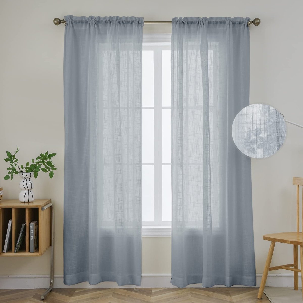 Joydeco grey faux linen sheer curtains with floral embroidery detail, draped on a window.