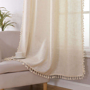 Joydeco beige boho linen curtains with natural texture and delicate tassel trim, shown in a room setting.