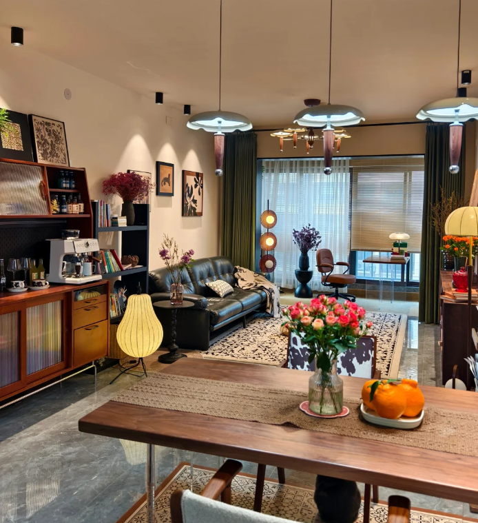 Blackout curtains in a stylish living room with large windows and modern furnishings.