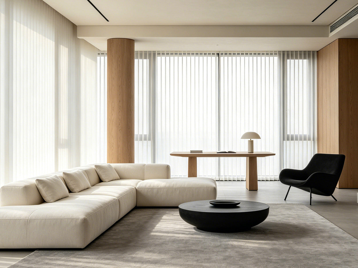 White back tab sheer curtains by Joydeco in a minimalist living room with a cream sectional sofa.