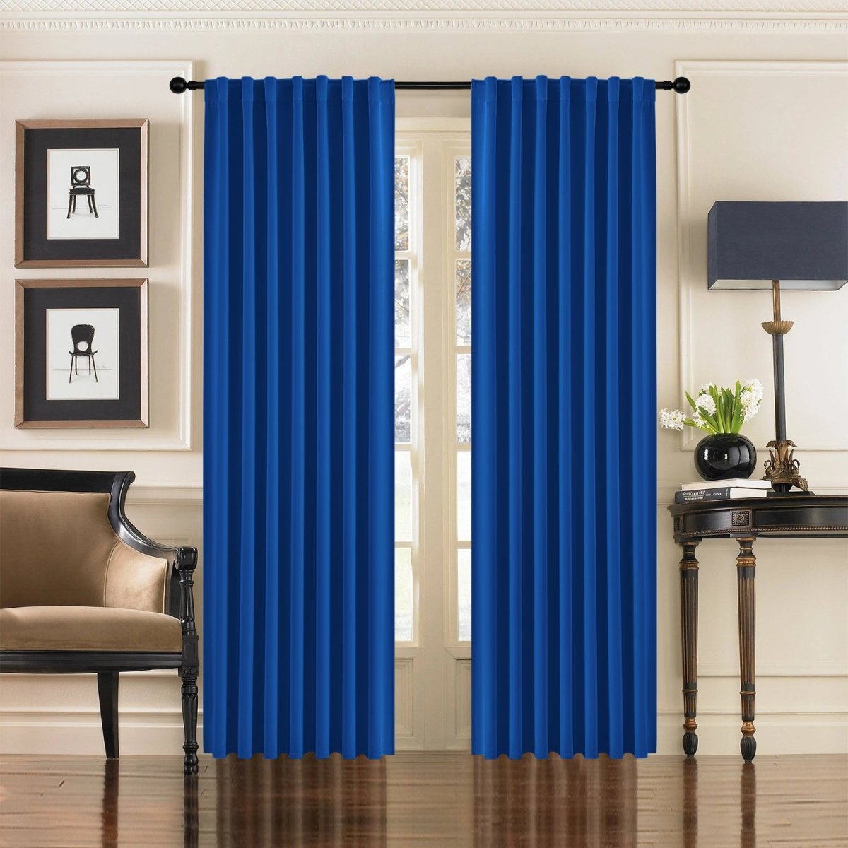 Joydeco royal blue blackout curtains, 96 inch, 2 panels, back tab, on French doors with armchair and table.