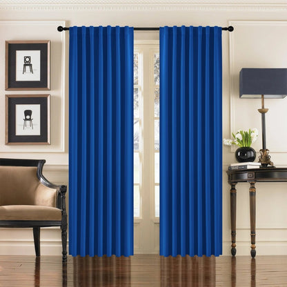 Joydeco royal blue blackout curtains, 96 inch, 2 panels, back tab, on French doors with armchair and table.