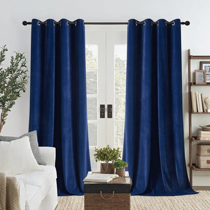 Two royal blue velvet blackout curtains with grommets on rod, covering double doors. Luxurious & thermal insulated.