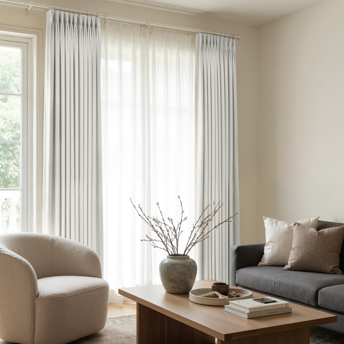Arden light grey satin blackout curtains with elegant pleats, modern window treatments.