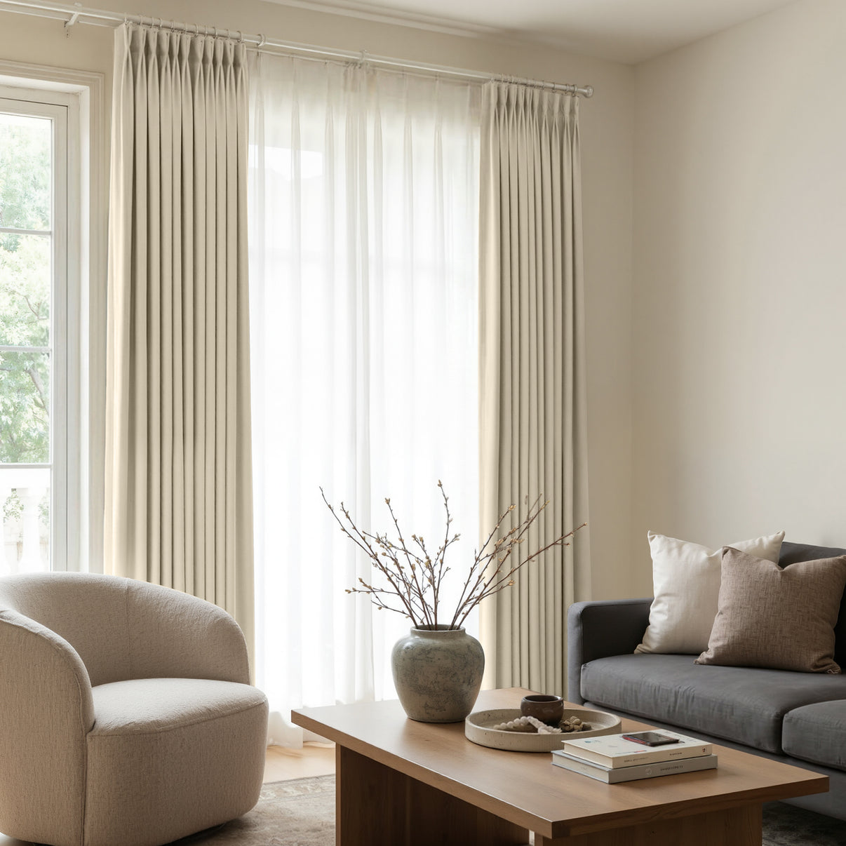 Arden Satin Blackout Curtain in beige, pleated, providing elegant 100% light blocking.