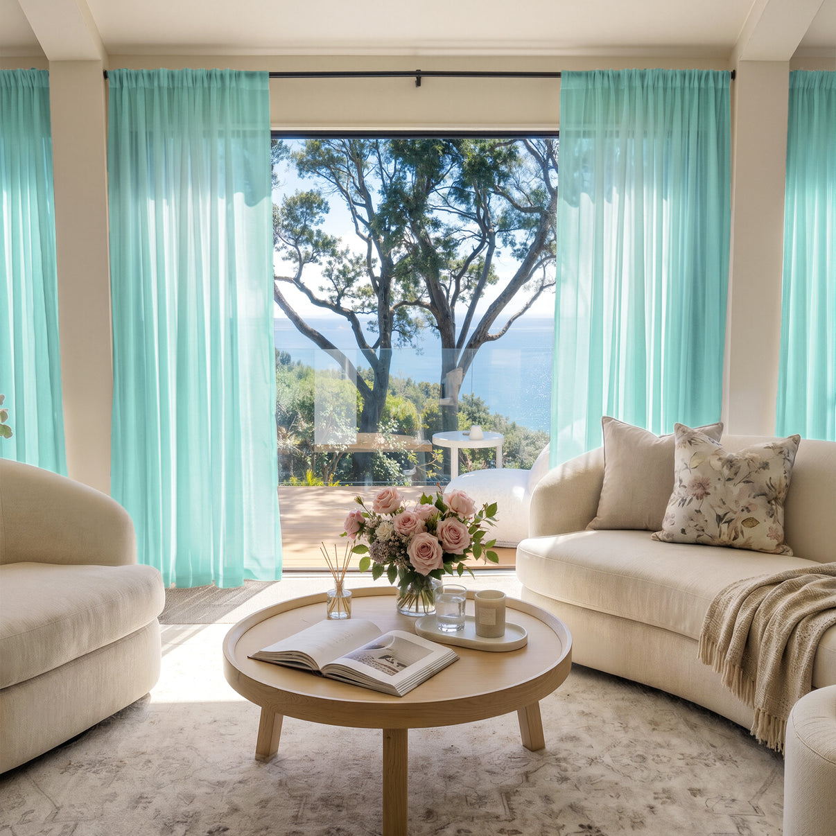 Light blue custom sheer curtains create an elegant, airy living space.