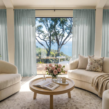 Feather custom lightweight sheer curtains: soft blue, filtering sunlight for airy rooms.