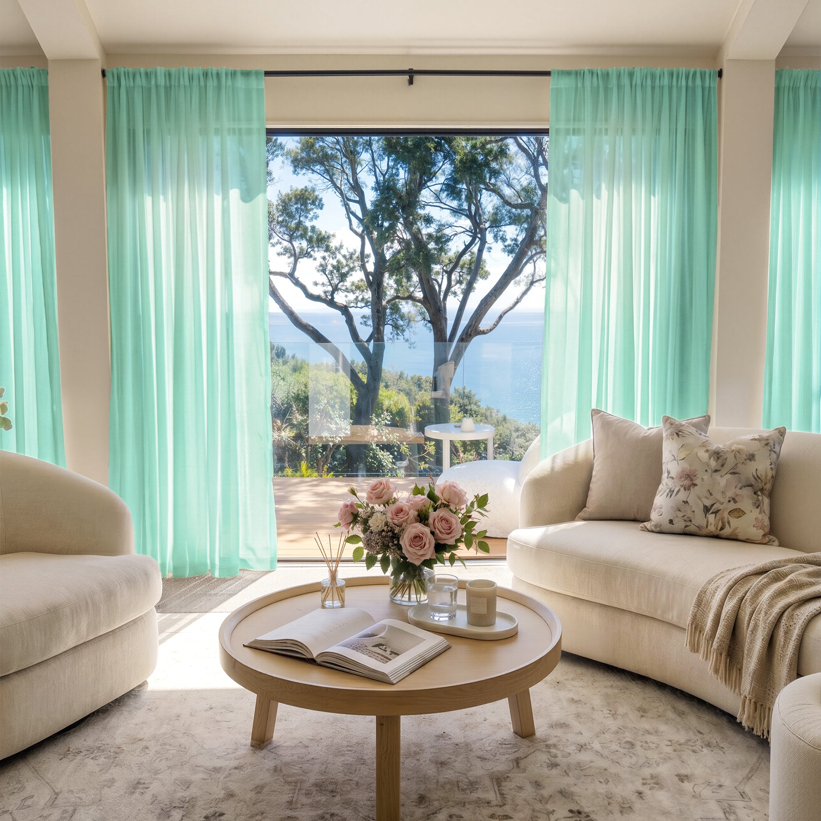 Joydeco lightweight aqua sheer curtains filtering sunlight for an airy, elegant living room.