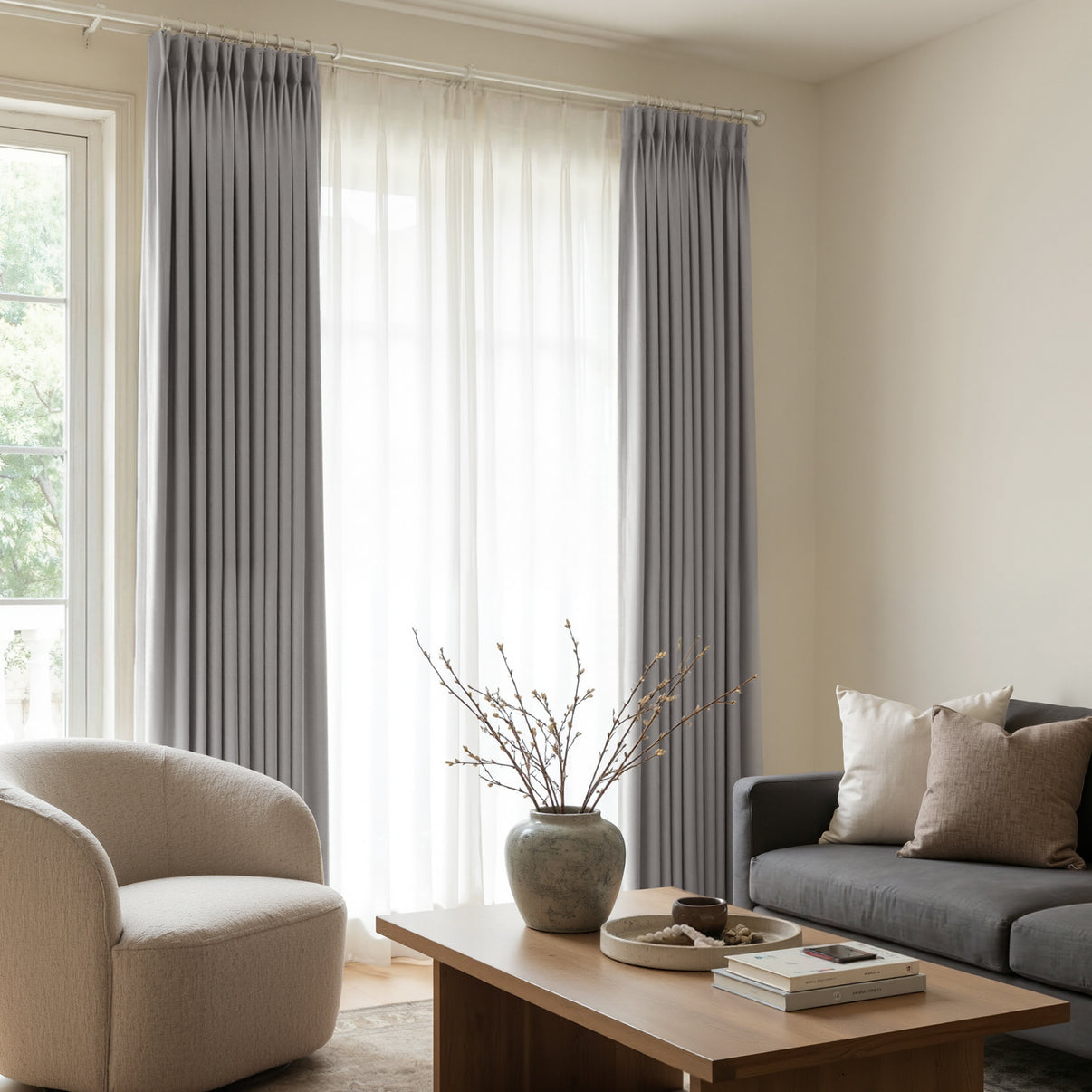 Arden Satin Blackout Curtain: grey pleated custom window treatment.