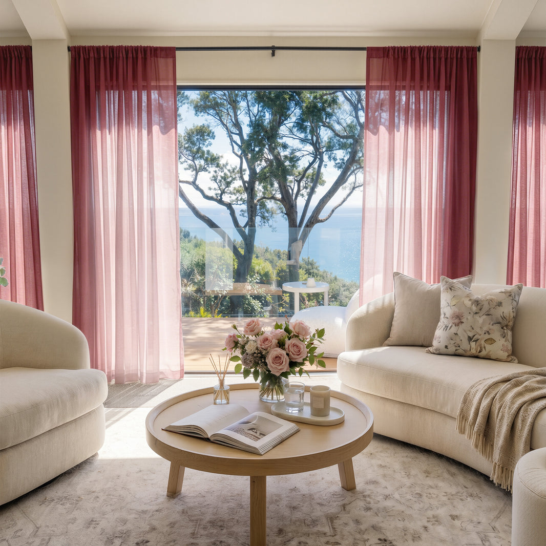 Feather custom lightweight sheer mauve curtains filtering sunlight in elegant living room.