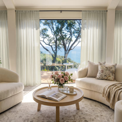 Feather Custom Lightweight Sheer Curtain in a bright, elegant living room setting.