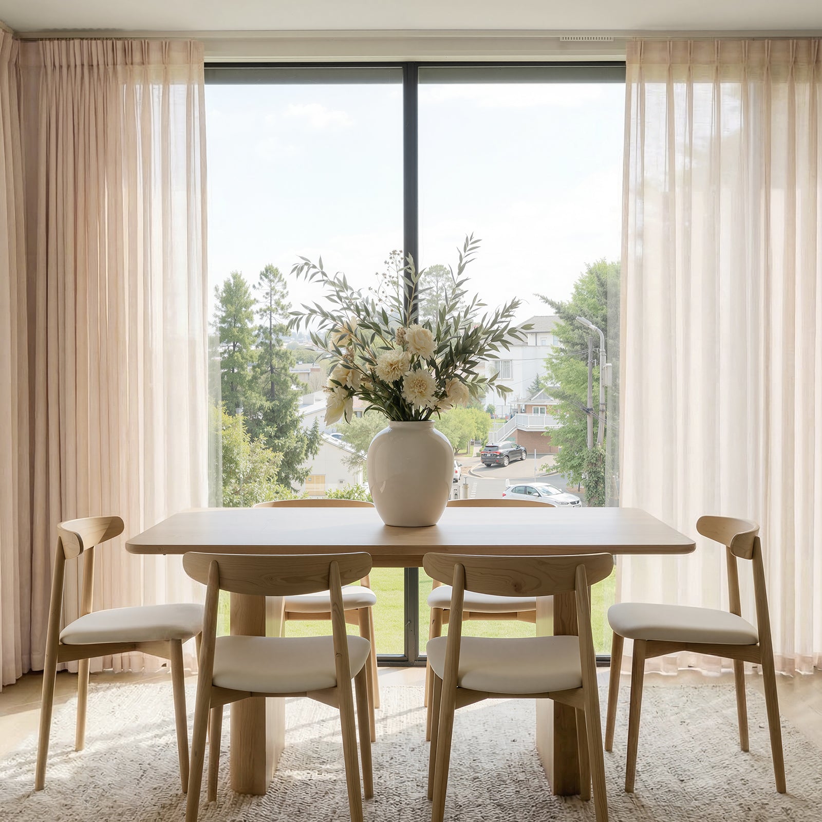 Light beige custom sheer curtains with linen texture, soft light filtering.