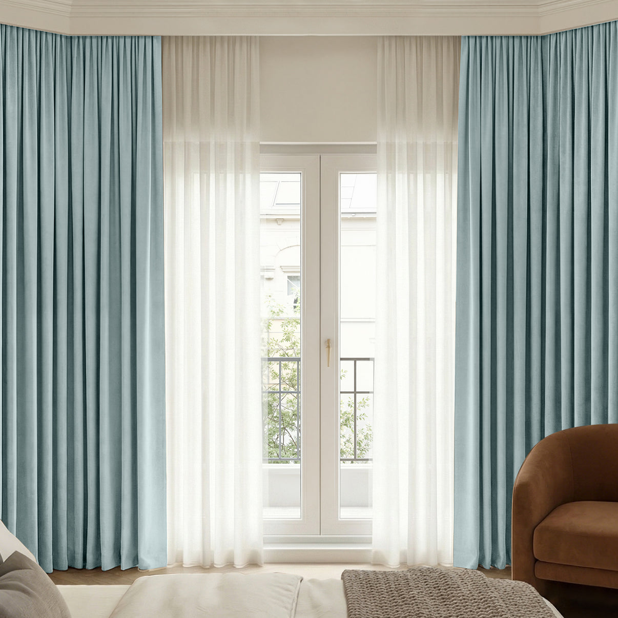 Bennett Chenille blackout curtain in light blue with sheer curtains.