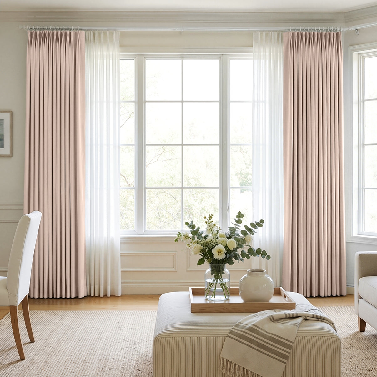 Hayden pale pink velvet blackout curtain with pleats over sheer drapes.