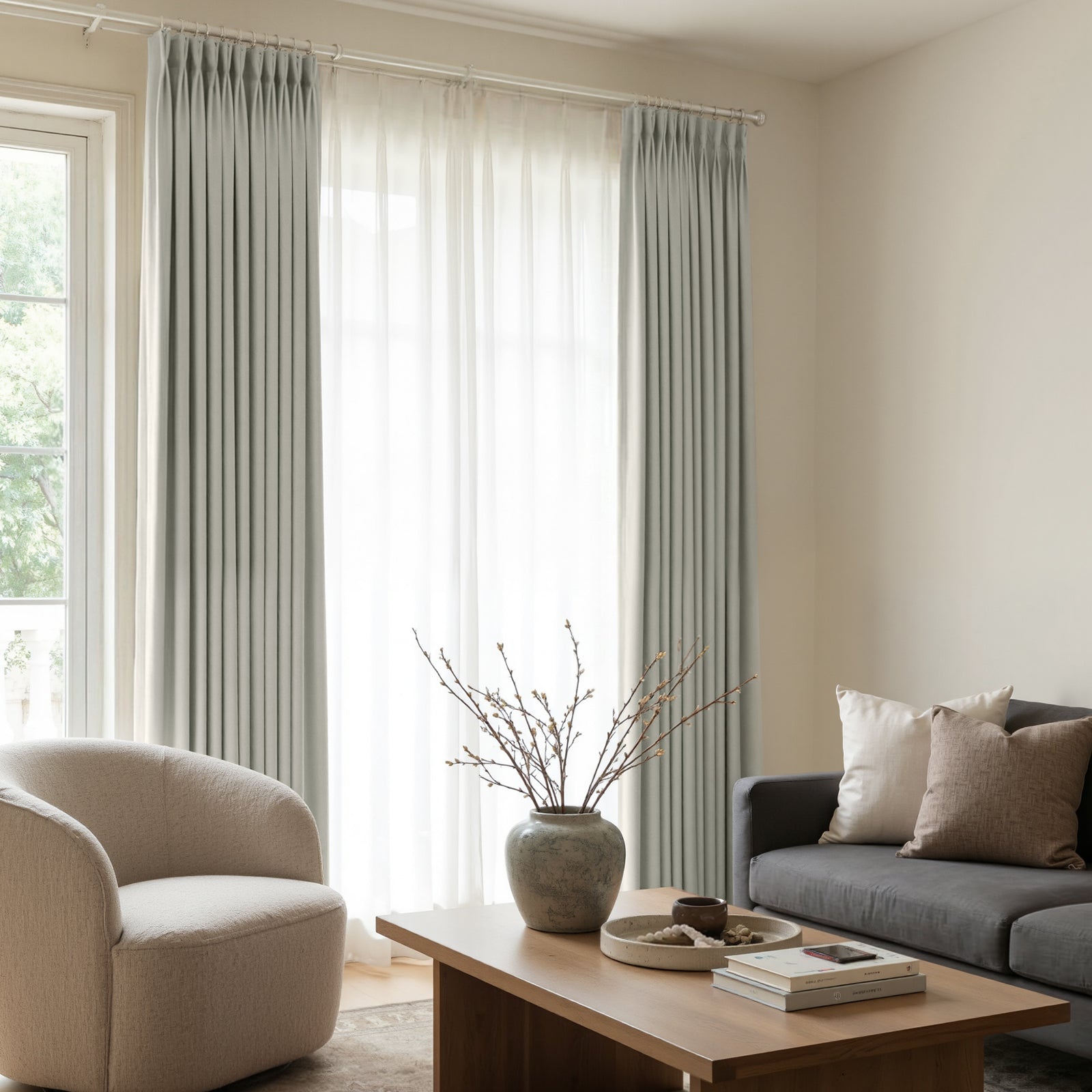 Arden light grey satin blackout custom curtains with pleats.