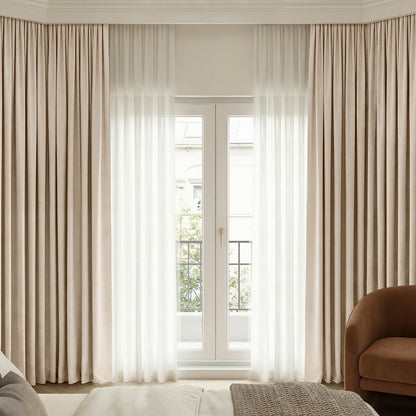 Bennett custom Chenille blackout curtains in beige with sheer white drapes