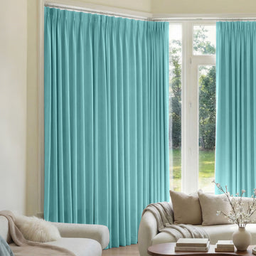 Teal custom Mason Triple Weave blackout curtains with pleats