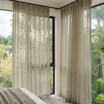 Linden Linen Blend Sheer Curtain, light filtering, pleated, neutral tone, framing greenery view.