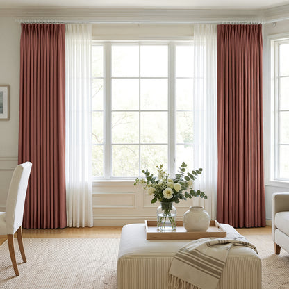 Custom dusty rose chenille blackout curtains with sheer white window treatments.