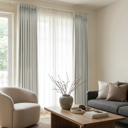 Arden satin blackout custom curtains with smooth texture and elegant pleats.