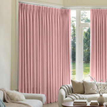 Pink custom triple weave blackout curtains for window treatments.