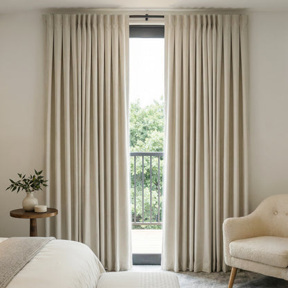 Everly Heavyweight Chenille Room Darkening Curtain in beige, 100% light blocking.