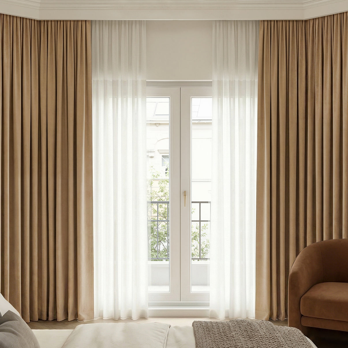 Custom taupe Chenille blackout curtains layered with sheer white sheers.