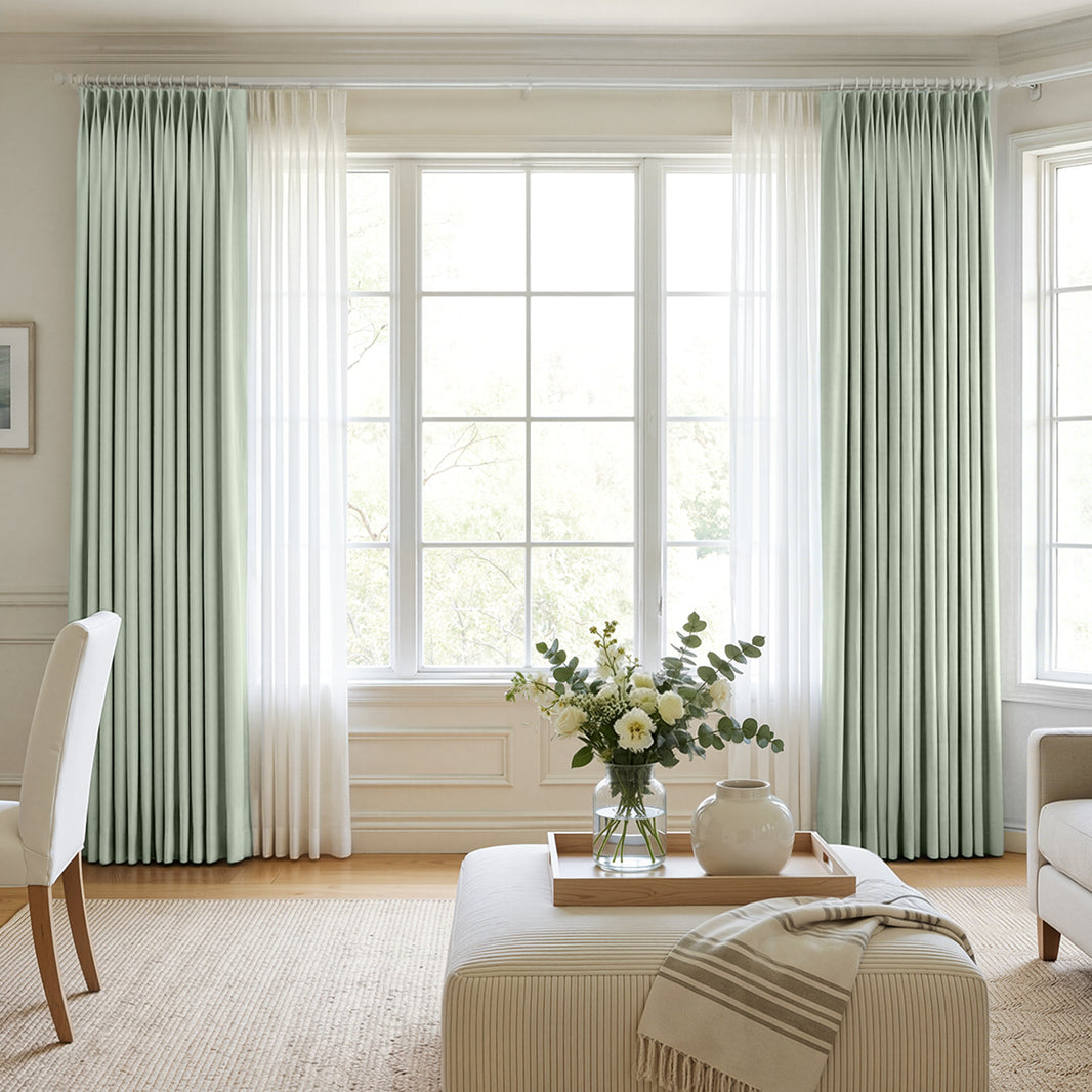 Hayden custom sage green chenille blackout curtains layered with sheer white.