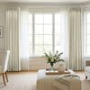 Cream chenille blackout curtains by Joydeco, styled with sheer panels for custom window treatments.