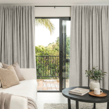 Alder grey custom faux linen blackout curtains with a natural textured weave.