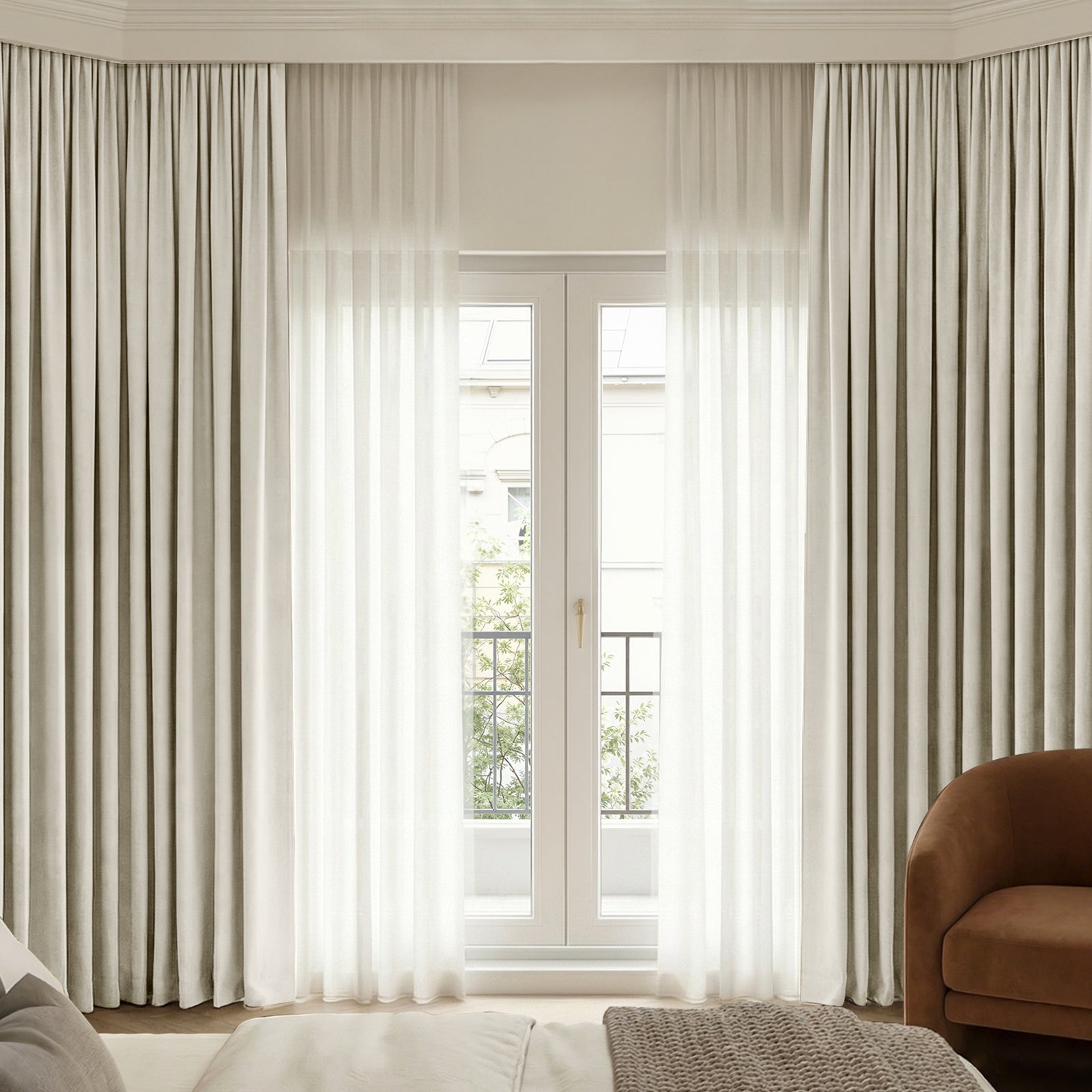 Custom beige Chenille blackout curtains with sheer layering on elegant French doors.