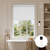 White motorized blackout roller shade in bathroom window with remote control