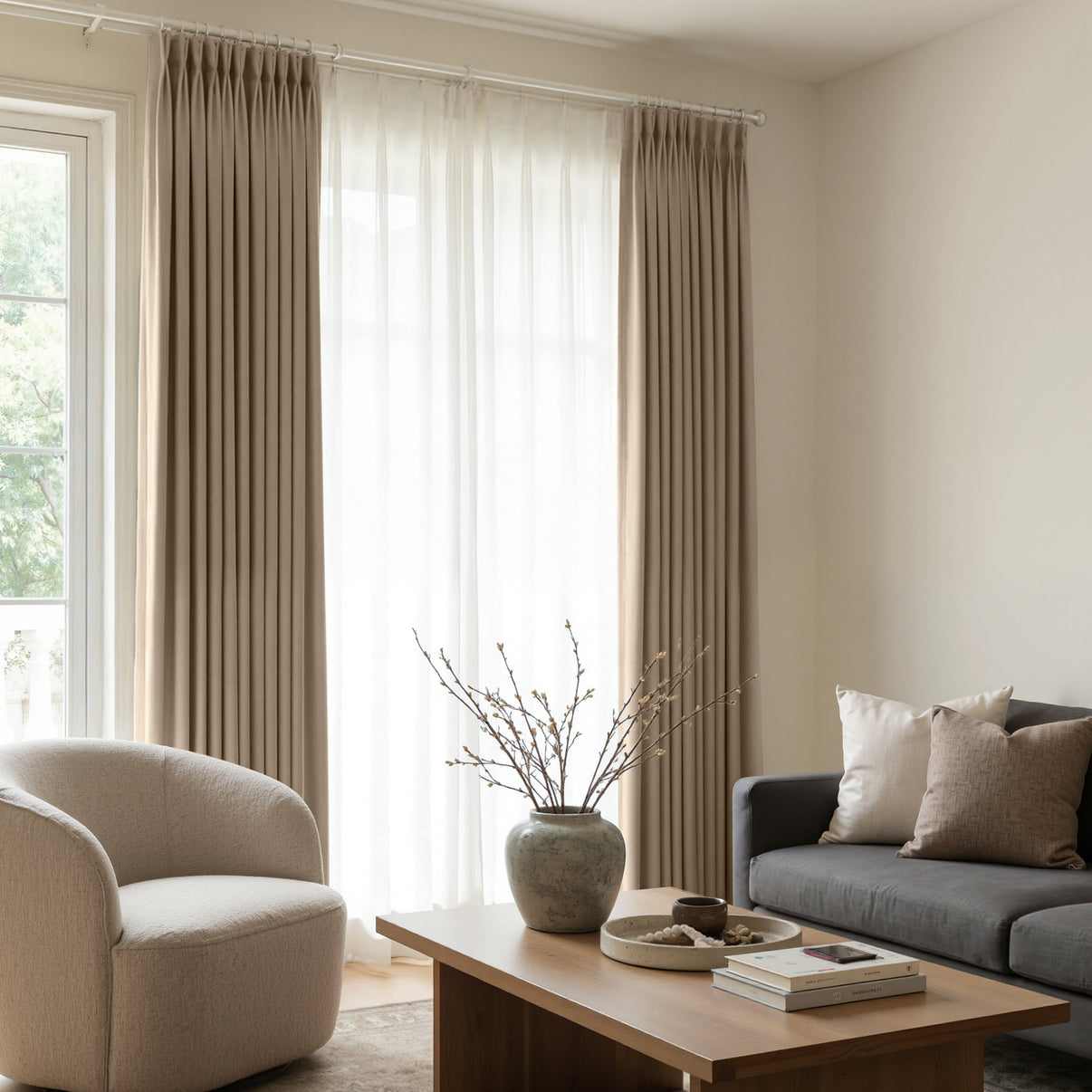 Joydeco taupe custom satin blackout curtains with pleated finish, layered with sheer drapes.