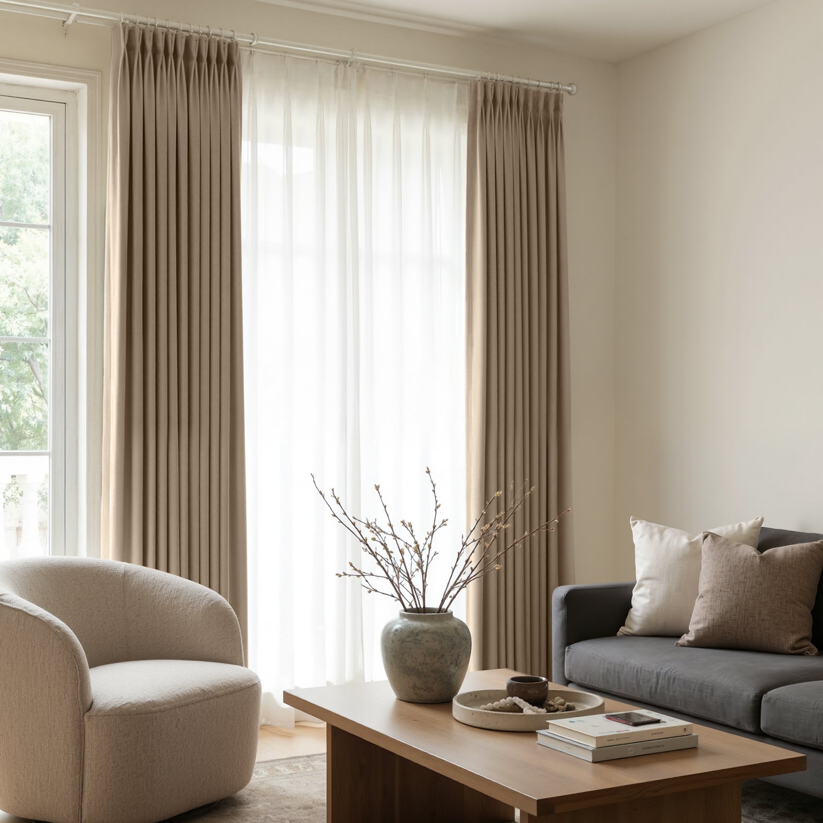 Joydeco taupe custom satin blackout curtains with pleated finish, layered with sheer drapes.