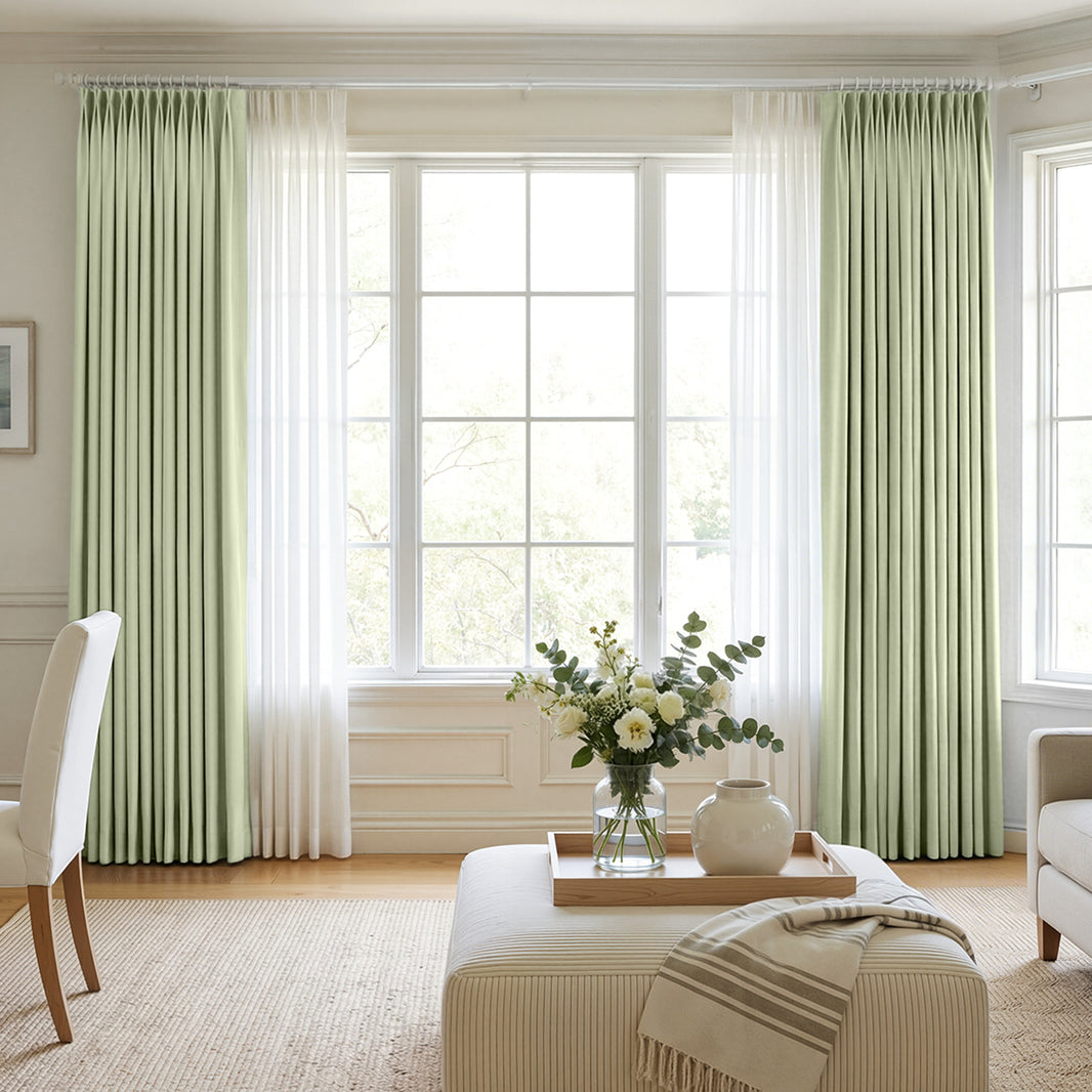 Hayden light green chenille blackout curtains with sheer panels.
