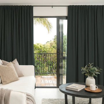 Alder dark faux linen blackout curtains, custom window treatments with textured weave.