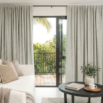 Alder custom light grey faux linen blackout curtains with textured weave.