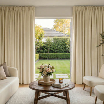 Haven Linen Blend custom blackout curtains in beige, featuring soft pleats and textured fabric.